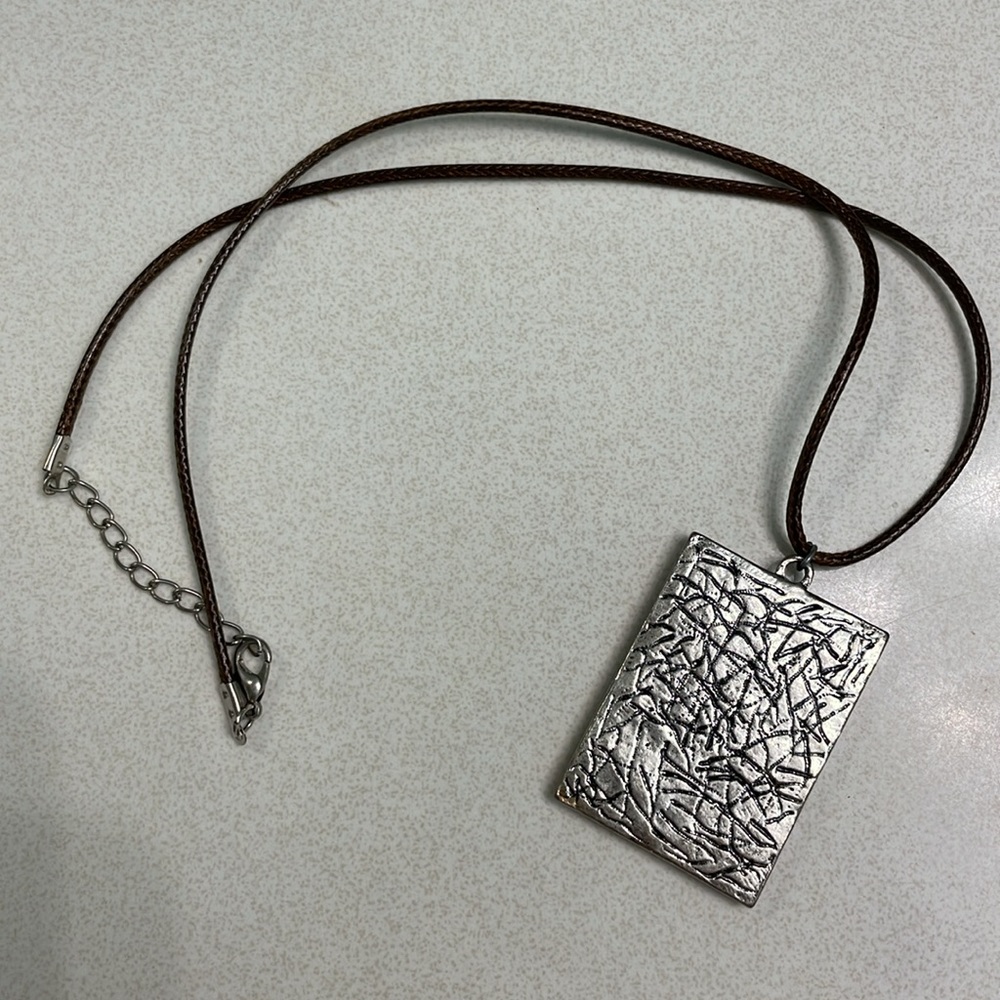 Reversible pendant necklace with braid rope chain. Pink /peach or silver sides